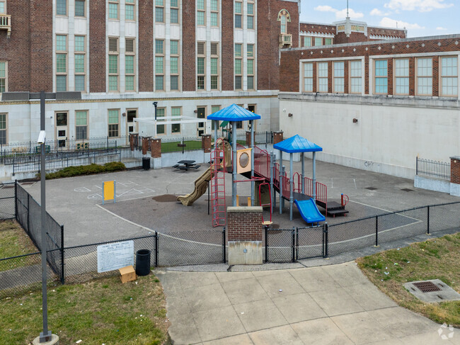 There is a playground in the back of the building that students enjoy.