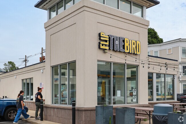 Gloucester Crossing customers flock to Flip the Bird for its crave worthy fried chicken sandwiches, served up hot, crispy, and packed with bold flavors in a laid back, casual setting.