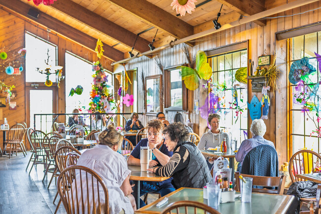 Birchwood Grill is a nearby restaurant in a wooden, lodge-style interior.