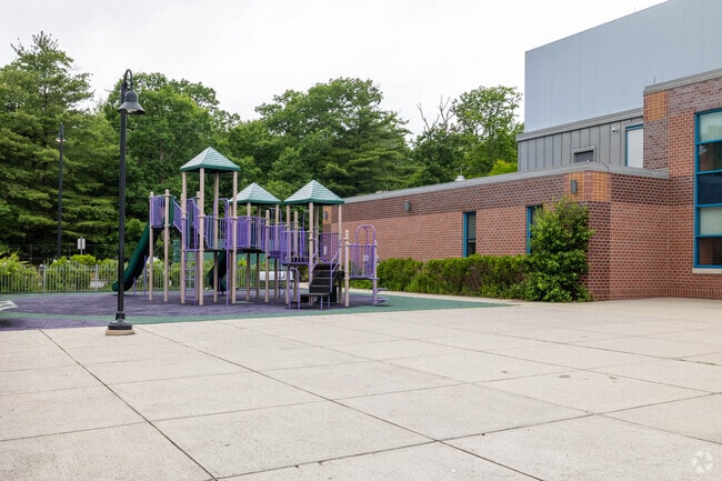 A new play structure sits on the campus of Manthala George Jr Elementary School In Brockton.