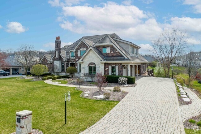 A beautiful large Tudor home located a gated and quiet Orland Grove neighborhood.