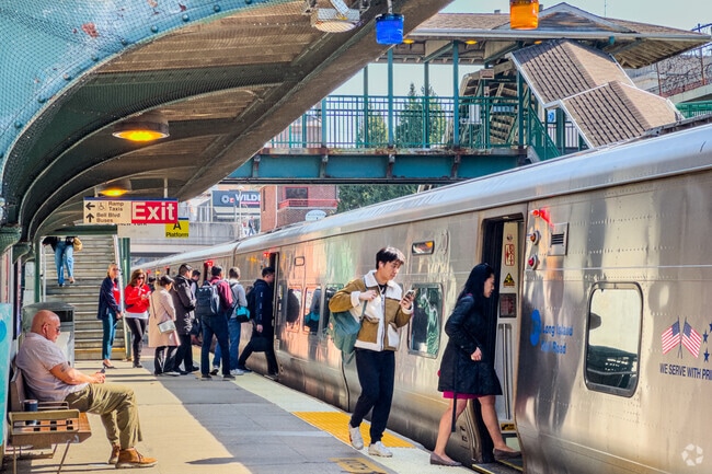 LIRR in Bayside has direct line to Manhattan.