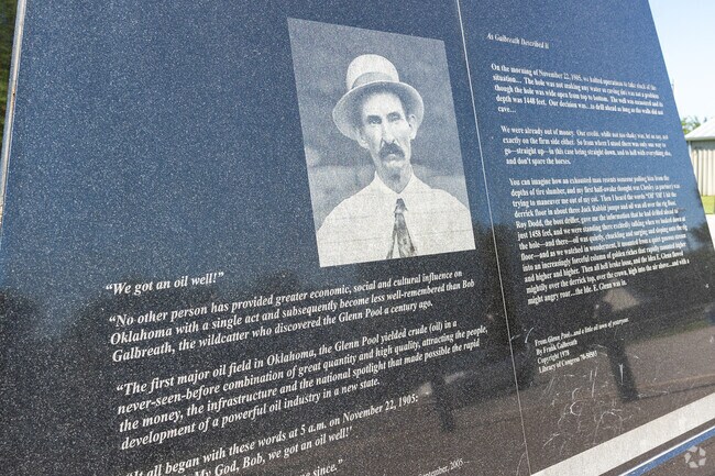 Glenn Pool Oil Reserve statue has the written history of Glenpool.