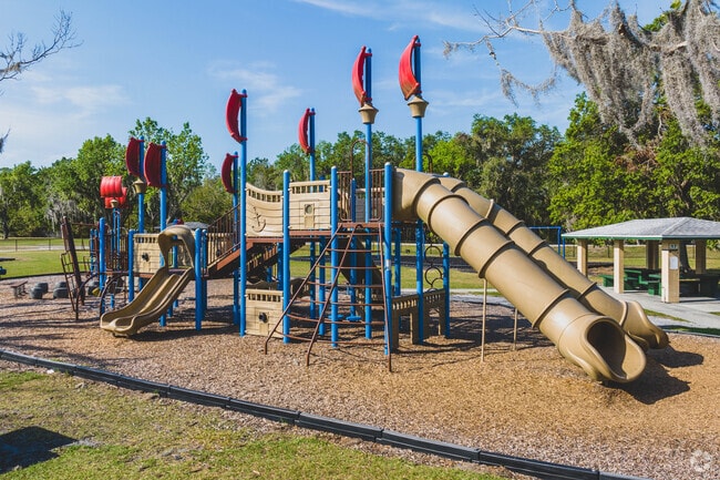 Kids can have fun on the Mary Holland Park playground, 2 miles from Gordon Heights, FL.