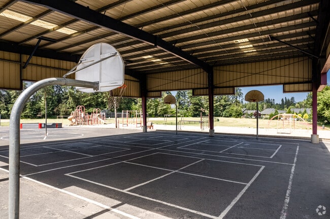 Students can practice their jump shot at the basketball courts at the school.