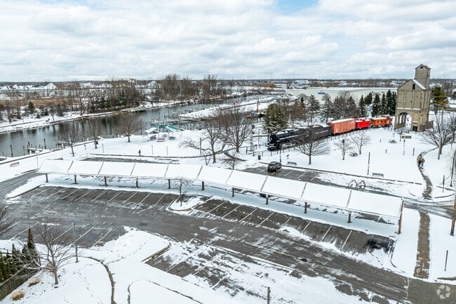 In Grand Haven's summer months, a docking area on the Grand River becomes a farmers market.