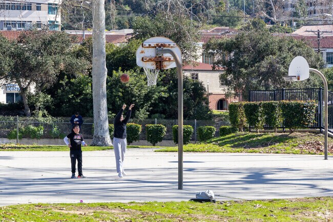 Children enjoy a game of basketball at Verdugo Park in College Hills.