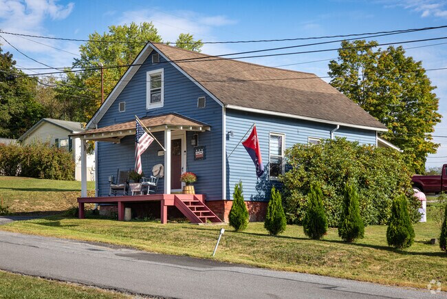 National and collegiate pride is on display at this freshly painted cottage in Grazierville, PA.