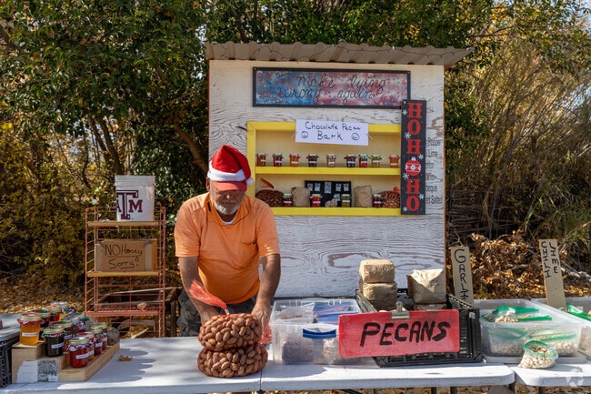 Neighbors love stopping at Ken's Pecan stand off Highway 80 for fresh honey and nuts.