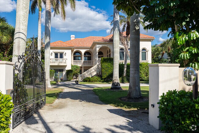 Many Casey Key homes are built in a grand Mediterranean style with gated entrances.