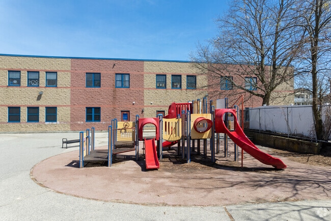 Students enjoy the Robert L Bailey IV Elementary School Playground in Lower South Providence.