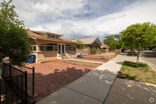 Brick patios and deep porches bring vintage charm to Silver Hill’s homes.