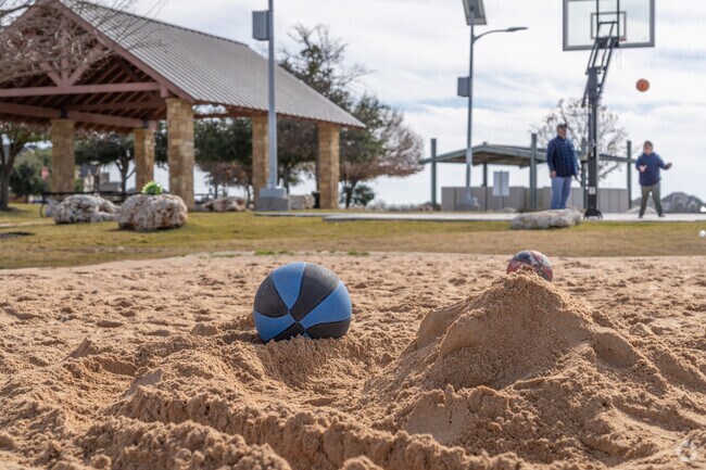 A sand volleyball court is available for use here at Rinderknecht Park.