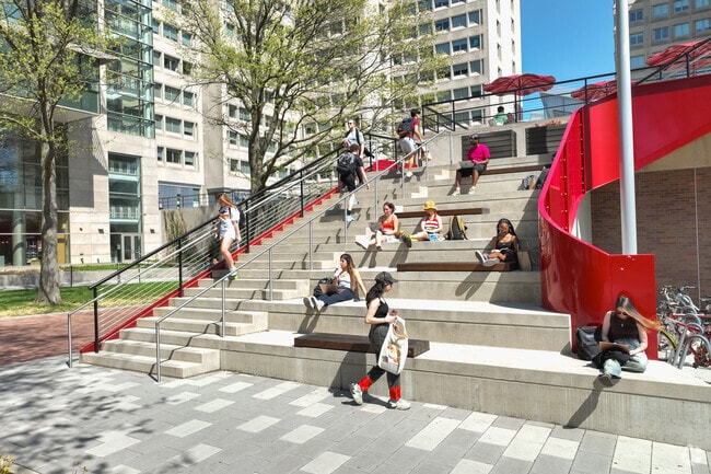 Rest upon the colossal steps outside Temple University's College of Liberal Arts.