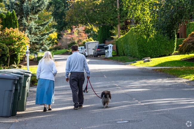 Evening walks are common along the scenic streets of Yarrow Point.