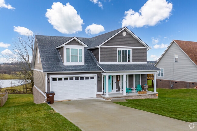 A two-story, Modern-Craftsman abode.