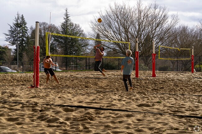 Cedar Hills residents enjoy beach volleyball in winter at Cedar Hills Park.