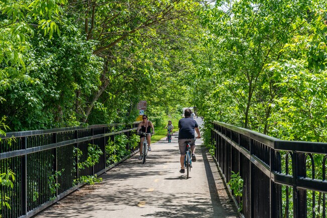 South Pointe residents ride their bikes along the West Branch DuPage River Trail.