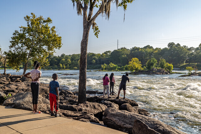 It's fun to walk close to the edge of the powerful Chattahoochee River rapids.