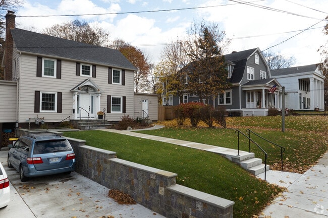 A classic colonial sits on a lined street of lovely homes in Milton, NY.
