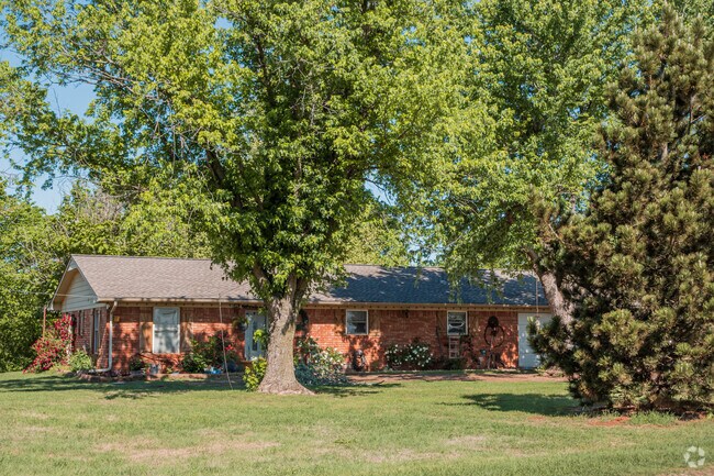 Cimarron City locals can find beautiful ranches shaded by mature trees.