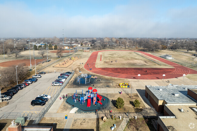 There is a full sized track field located behind Lawrence Elementary School.