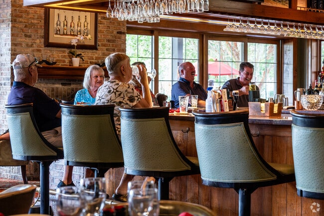 Bridgeport residents gather at the restaurant and bar in Arnold Palmer Legends Country Club.