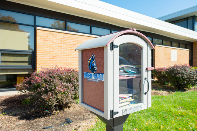 A book library for the students in front of the school at Sieden Prairie Elementary School.