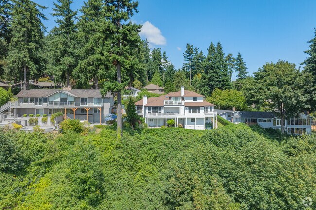Impressive custom homes sit on the hillside in Tarywood overlooking Lake Washington.