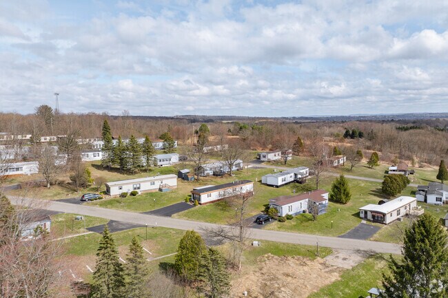 Built over one of Ellery's many hills, the manufactured homes line up side by side and have a great view of the town.