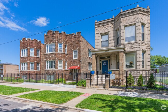 Residents appreciate their fenced-in lawns in West Woodlawn.