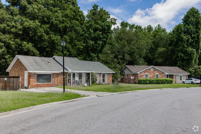 Explore beautiful brick homes with wide streets in Woodstock.