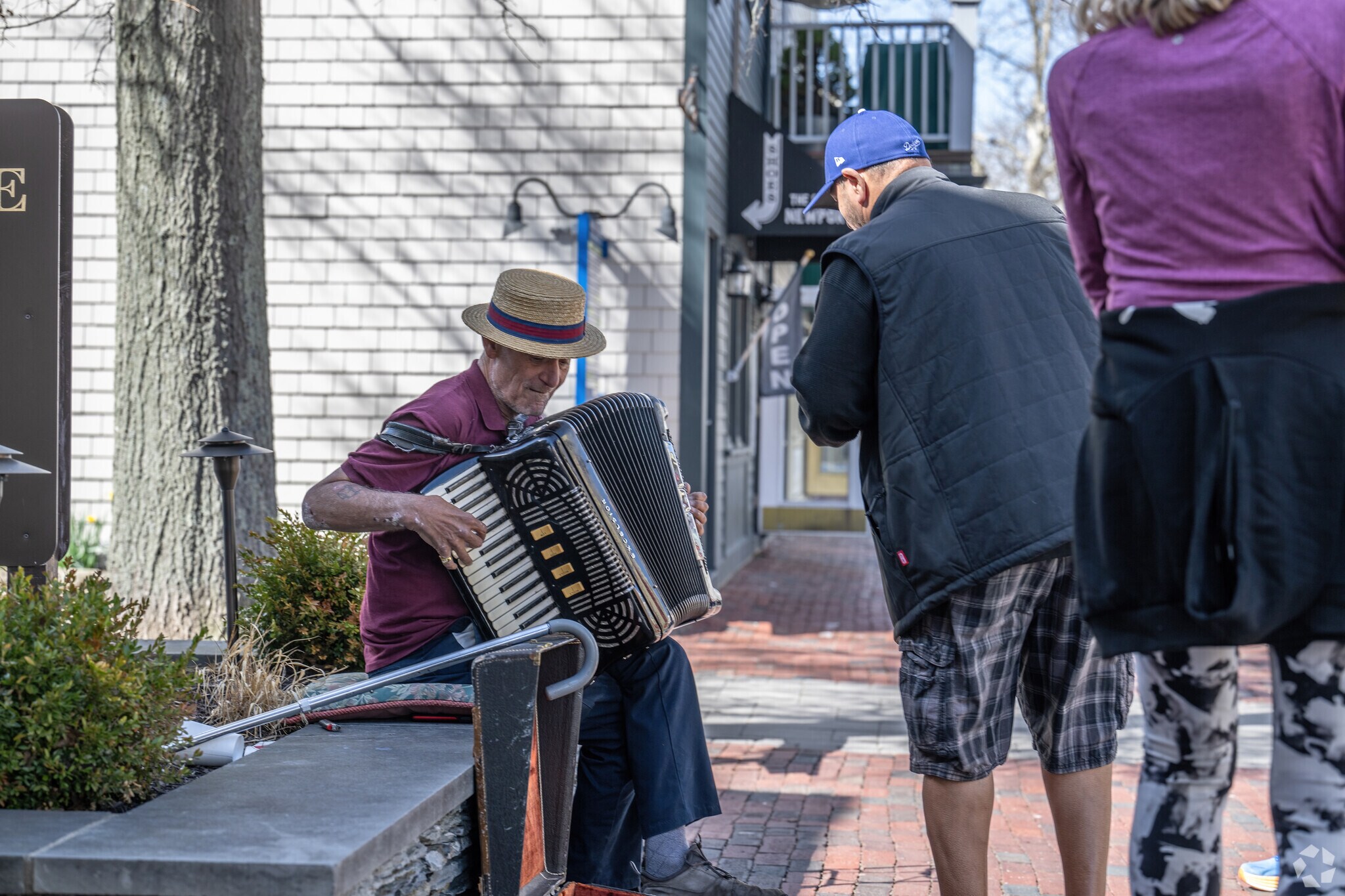 Melville residents can easily access the downtown lifestyle in Newport with music and jokes.