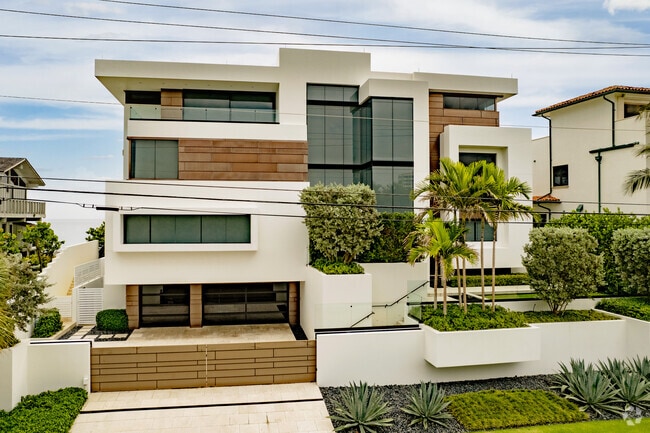 An oceanfront modern style home along the beach in Highland Beach, FL.