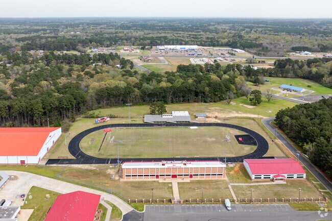 Cheer on the football team at Magnolia High School.