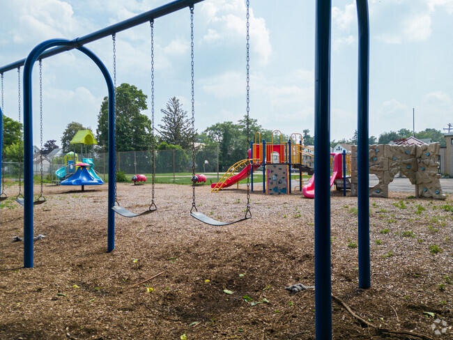 Lincoln Elementary Community  School have a beautiful playground  with swings and slides.