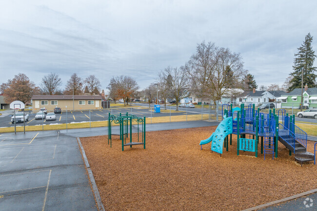 Longfellow Elementary has a small playground behind the shcool.