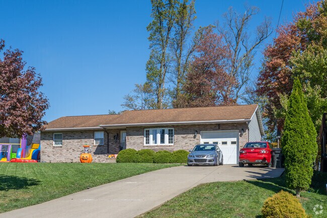Established ranch style homes can be found in the Mileground neighborhood.