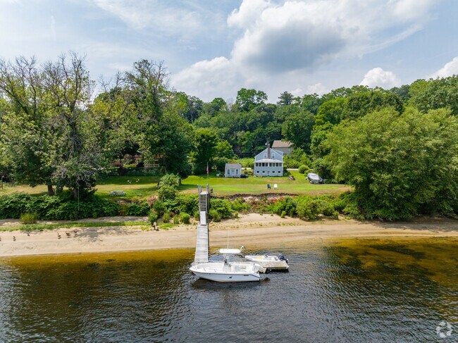 Spacious homes with boat docks sit in a private section along the Merrimack River in Haverhill.