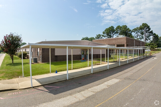 Greenbrook Elementary School has covered drop off and pick up.