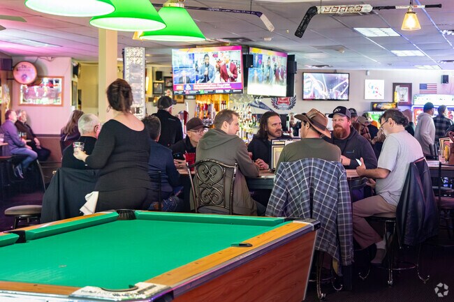 Locals love the pool tables, food, and drink options at West Hill Grill in West Belleview.
