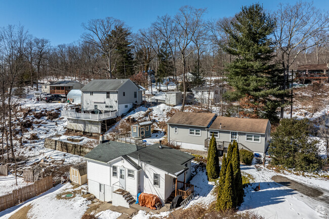 Homes in Oak Ridge range from colonial to ranch-style, offering a cozy and scenic suburban lifestyle.