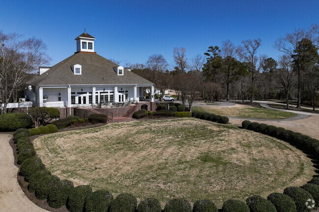 The upscale Clubhouse Restaurant in Albemarle Plantation offers waterfront dining with golf course views.