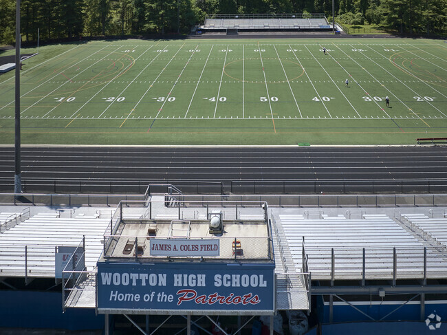 Students enjoy the sports field at Thomas Wooten High School.
