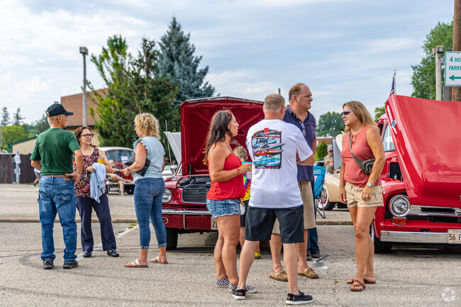 Chat with car enthusiasts at the Antioch Classic and Custom Car Show.