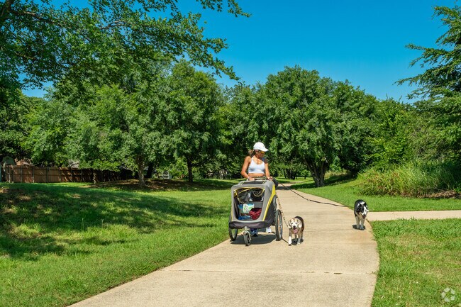 Stop by Cross Timbers Park in Highland Oaks for tree lined walking trails.