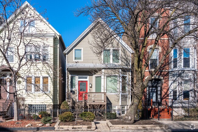 There are many two story wood framed homes in the Wrigleyville neighborhood.