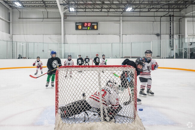 Keep your head up and pick a corner on the ice of The Bog in Kingston.