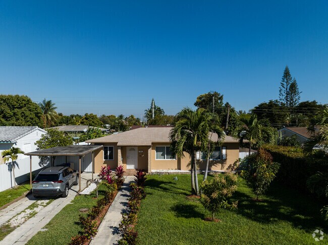Well-manicured lawns are a frequent sight in the Biscayne Highlands neighborhood.