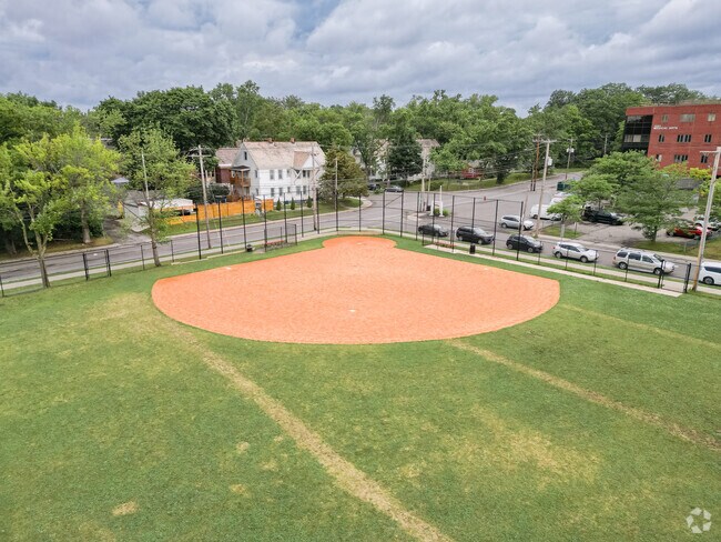 Onida Middle School playground  and baseball field also backs the street keeping children safe.